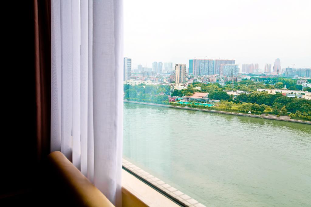 Shanghui International Hotel Cantão Quarto foto