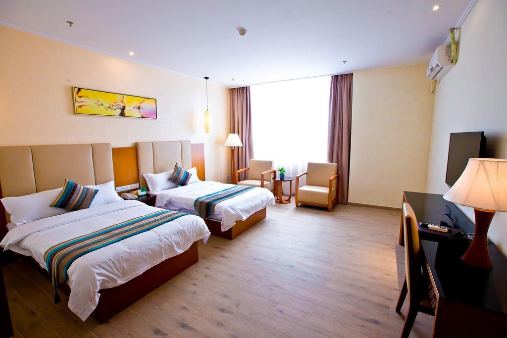 Shanghui International Hotel Cantão Quarto foto