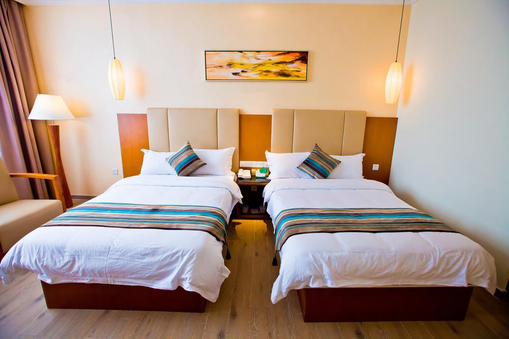 Shanghui International Hotel Cantão Quarto foto
