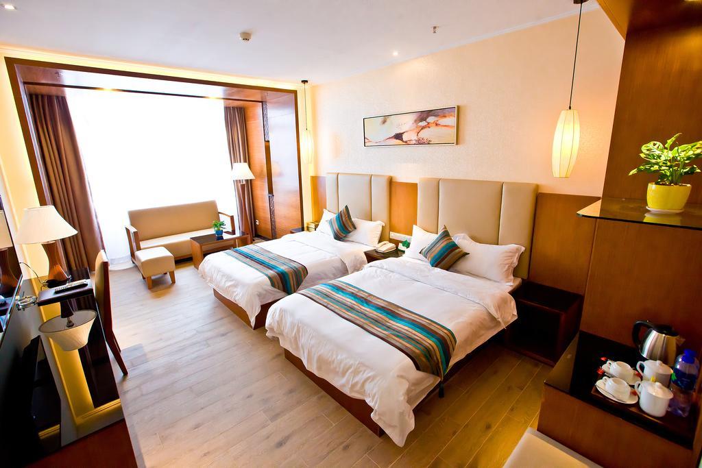 Shanghui International Hotel Cantão Quarto foto
