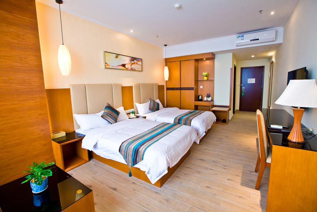 Shanghui International Hotel Cantão Quarto foto
